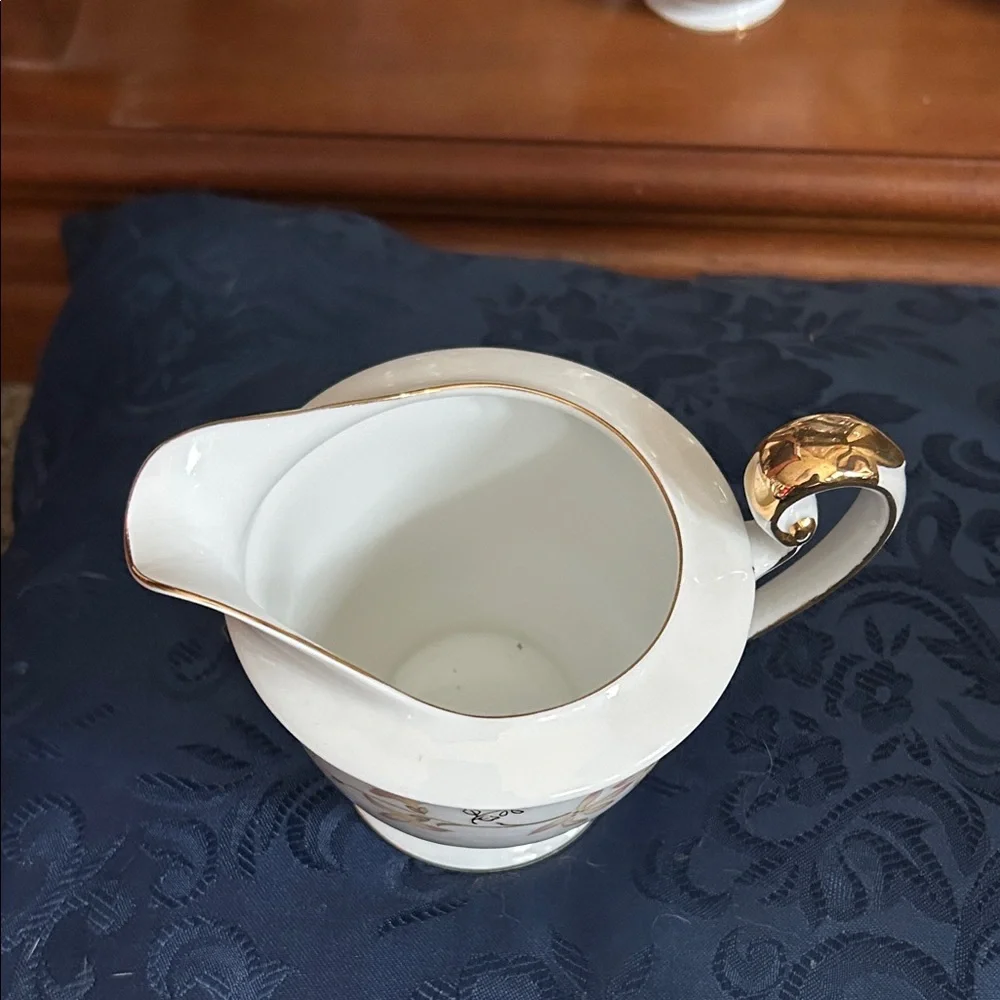 Porcelain Creamer Pitcher with Gold Trim and Floral Motif